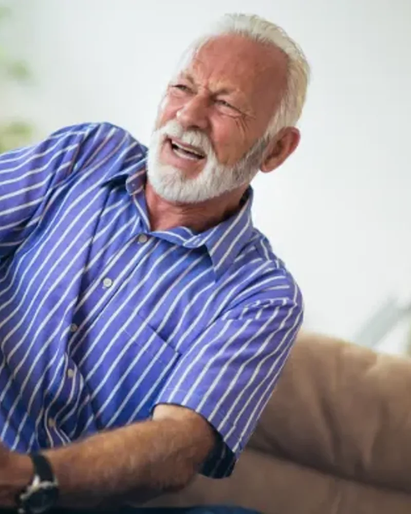 Therapist working with a patient on chronic pain management exercises