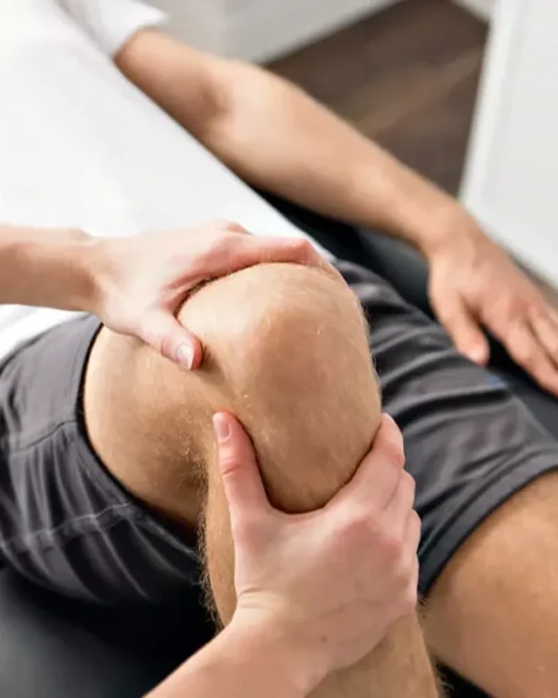 Physical therapist working one on one with a patient
